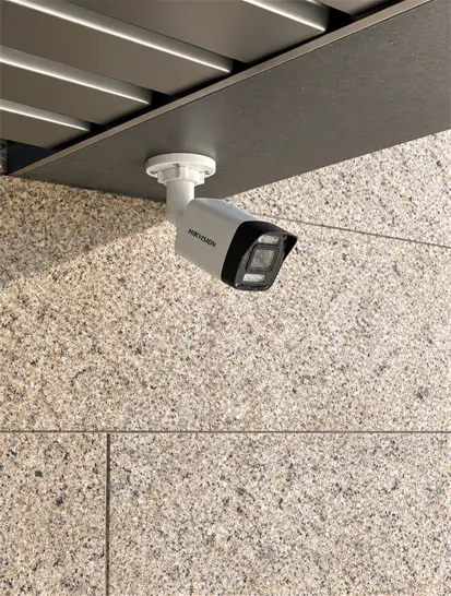 Outdoor bullet camera under a roof overhang