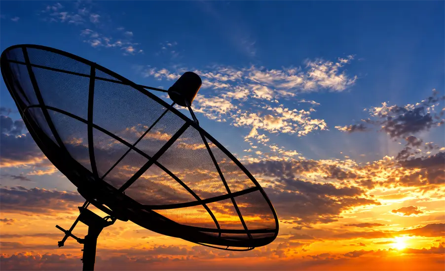 Satellite dish at sunset